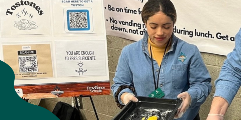 Liana Borts, a FoodCorps member in Providence, serves up tostones at a cafeteria taste test.